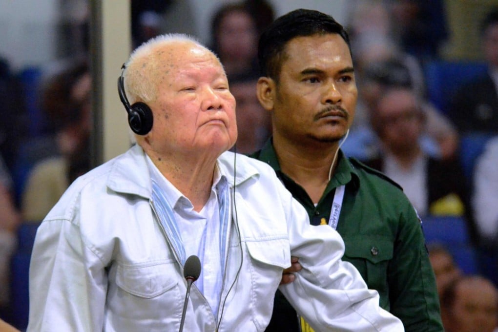 Khmer Rouge leader Khieu Samphan listens to his verdict at the Extraordinary Chambers in the Courts of Cambodia in Phnom Penh on Friday. Photo: AFP