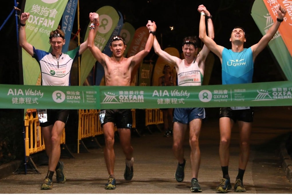 (From Left) Brian McFlynn, John Ellis, Jeff Campbell, and Michael Skobierski cross the finishing line in first place. Photos: Felix Wong