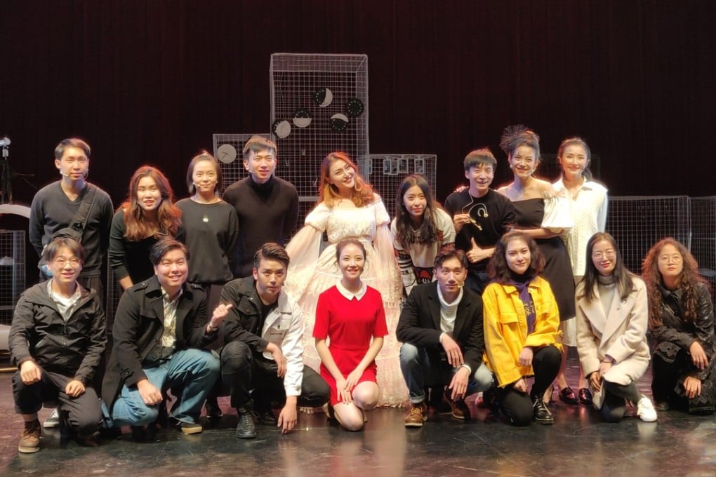 Tuyouqin, fourth from right back row, with the cast of her new musical. Photo: Handout
