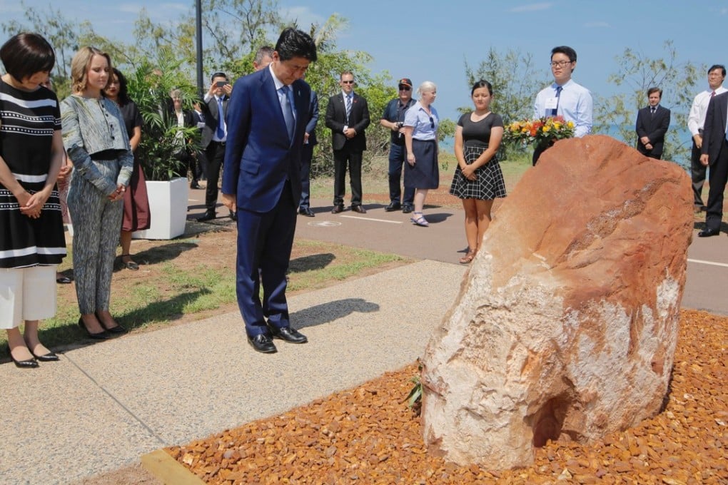 Japanese Prime Minister Shinzo Abe visiting a memorial to the Imperial Japanese Navy’s I-124 submarine, which sank in 1942 off the Northern Territory city of Darwin, Australia on November 17, 2018. Photo: Reuters