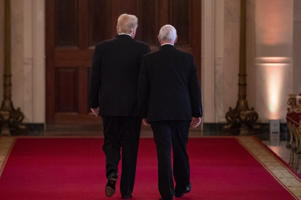 US President Donald Trump referred to Vice-President Mike Pence as ‘a trooper’ who has ‘already been tested, in many ways’. Photo: EPA