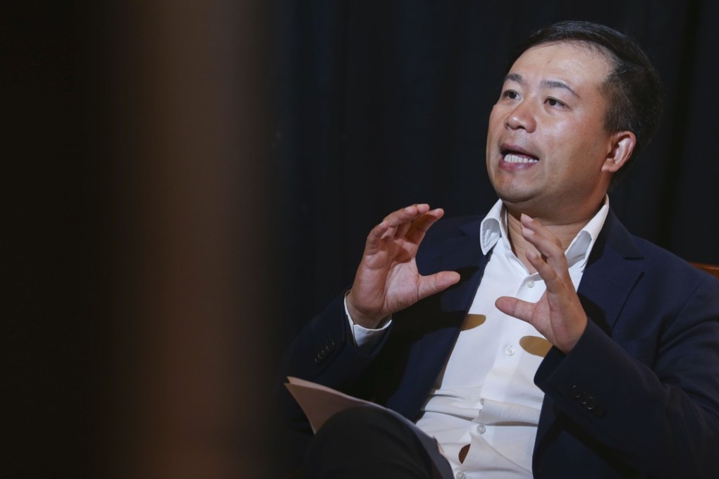 Ping An Good Doctor founder and chief executive Wang Tao says the company plans to roll out “hundreds of thousands” of its unstaffed, AI-assisted clinics across the mainland in three years. Photo: David Wong