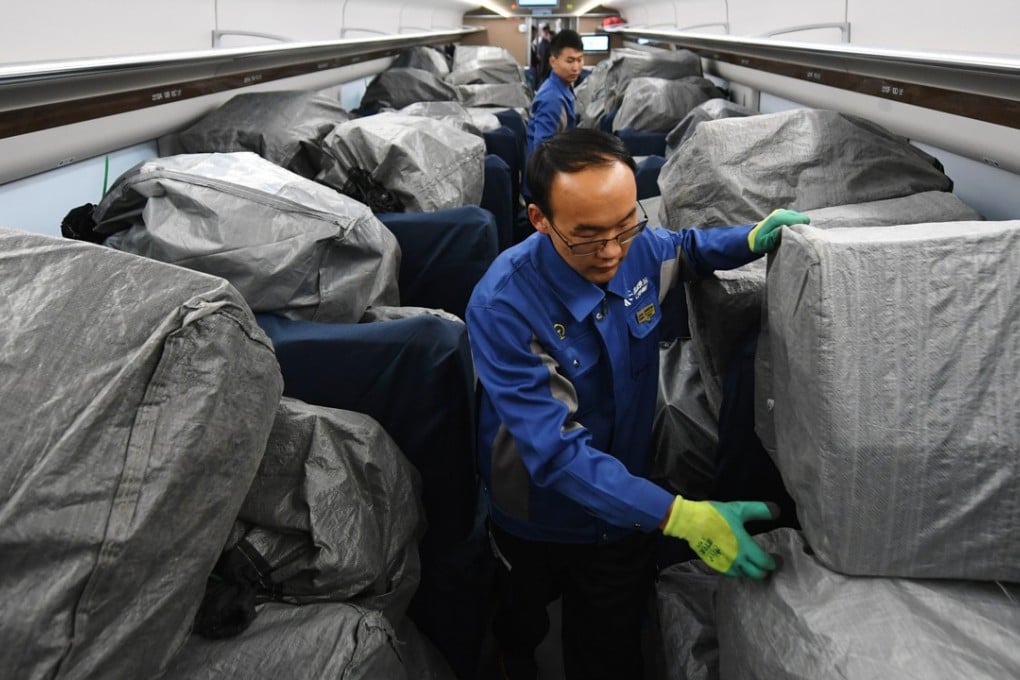 Bundles of parcels wrapped in plastic are stacked on a train at the Lanzhou West Railway Station in Gansu’s provincial capital of Lanzhou on November 11, 2017. A record 1.87 billion parcels will be delivered in the six days following the 2018 Singles’ Day online shopping gala, according to estimates by China’s national postal service. Photo: Xinhua