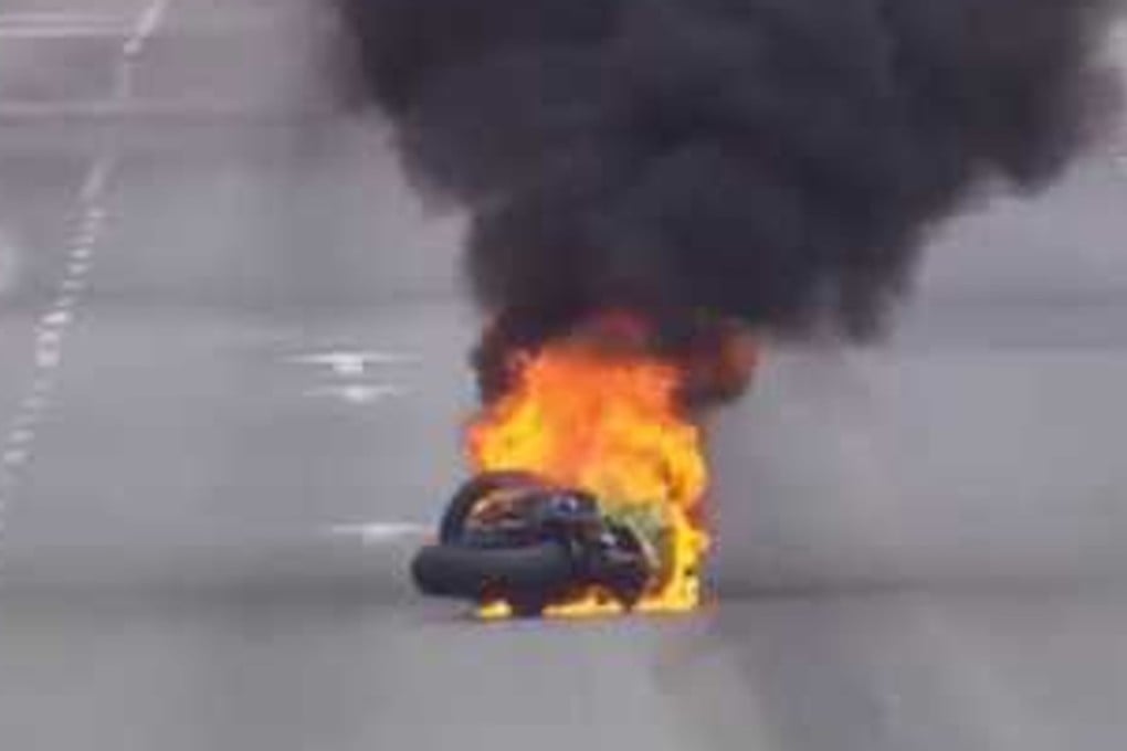 Raul Torras’ bike bursts into flames at the Guia Circuit. Photo: Macau Grand Prix