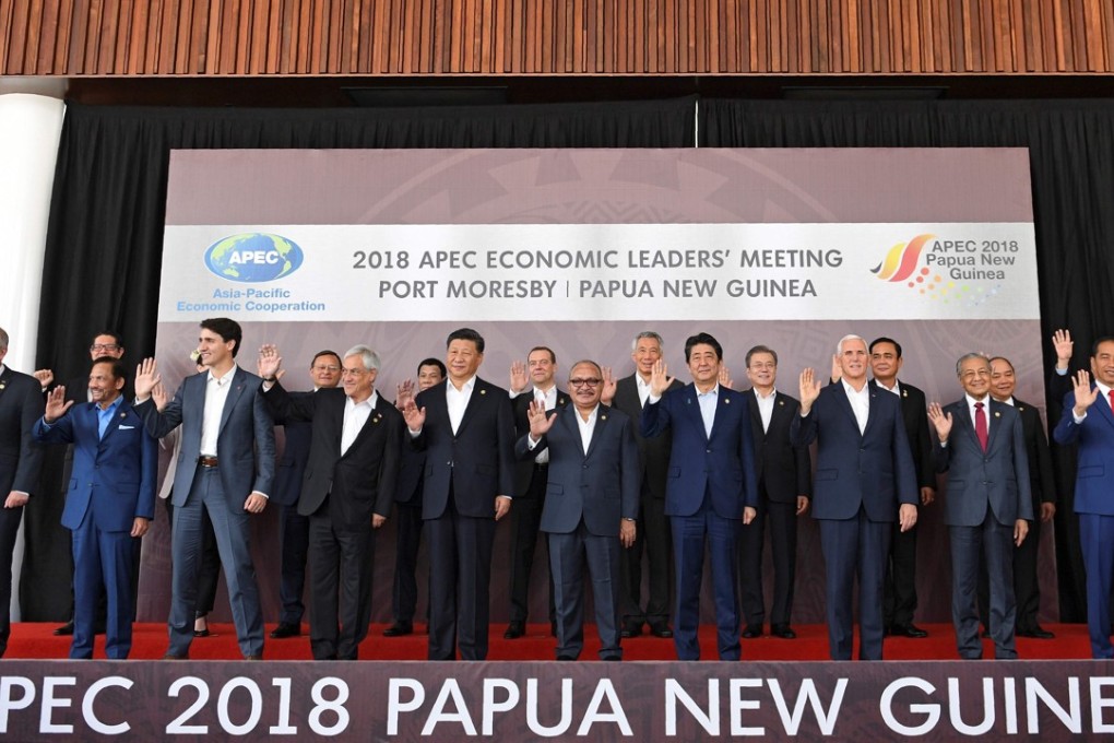 Attendees pose for a ‘family photo’ at the Apec Summit in Port Moresby on November 18, 2018. Photo: AFP