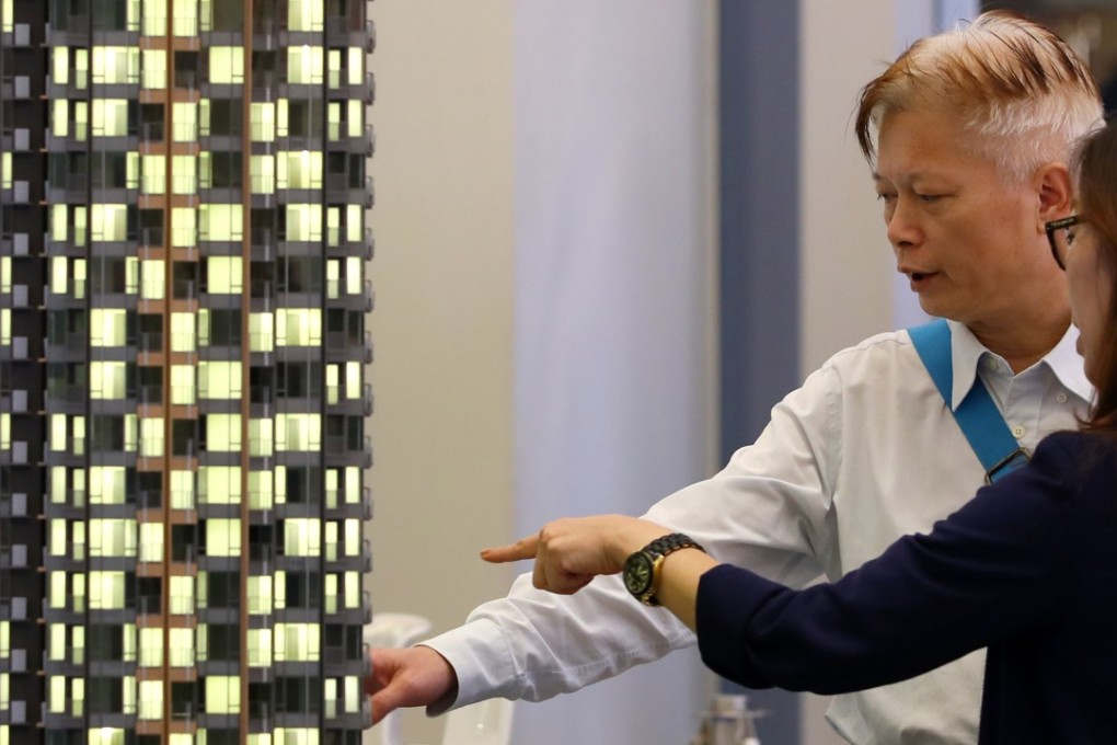 Potential homebuyers buyers assess a showroom mock up of the Reach Summit development by Henderson Land on November 5, 2018. Photo: Edmond So