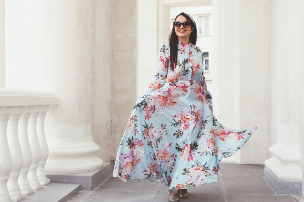 Long-sleeved floral maxi dresses are as winter wedding-appropriate as their short-sleeved counterparts.