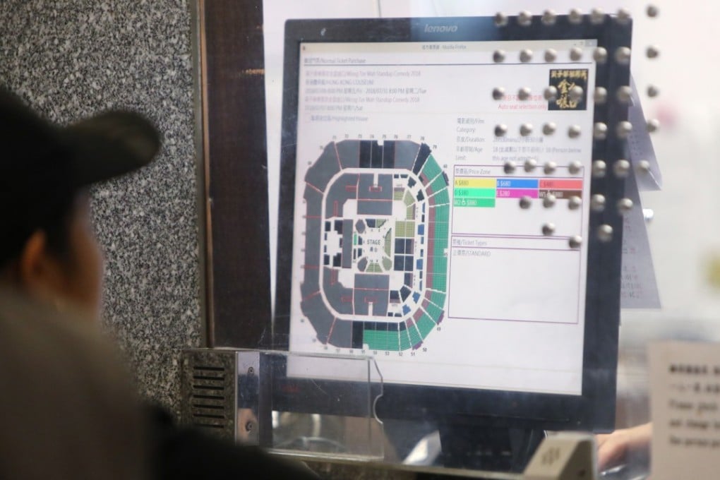 A fan chooses tickets for Dayo Wong Tze-wah’s stand up comedy show at City Hall in Central. Photo: Winson Wong