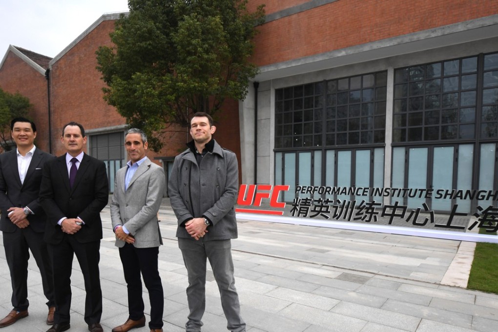 The UFC’s Kevin Chang, Lawrence Epstein, Andrew Schleimer and Forrest Griffin outside the UFC Performance Institute in Shanghai. Photo: UFC