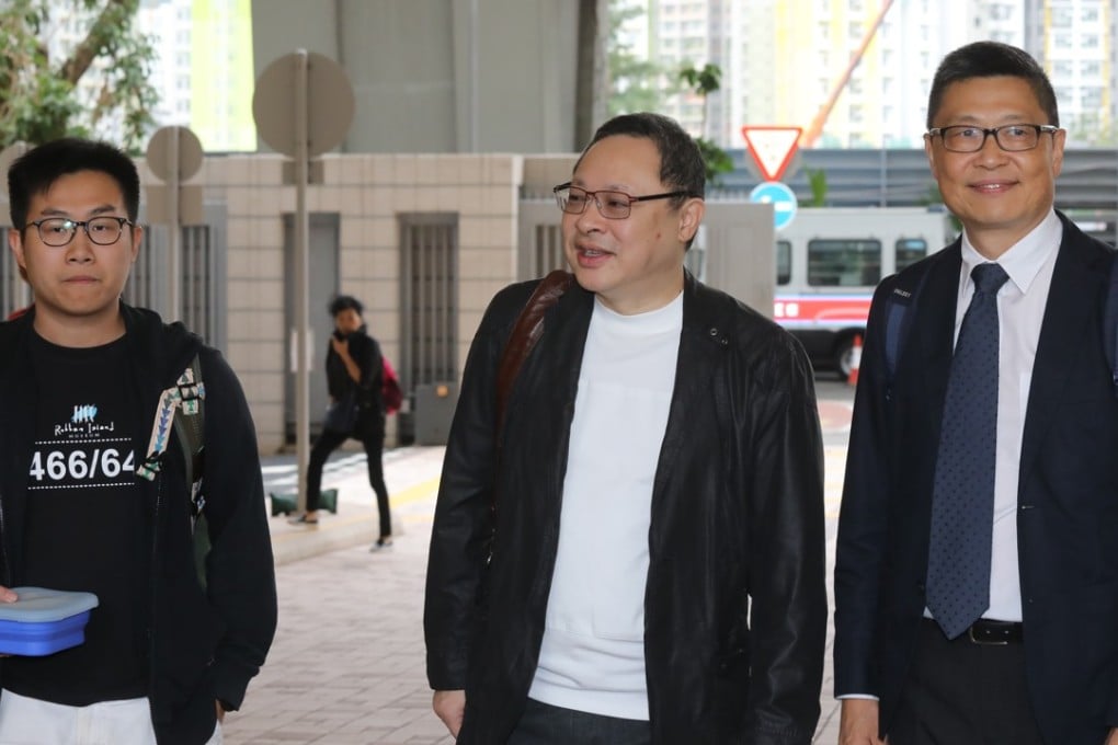 Raphael Wong (left), Benny Tai (centre) and Chan Kin-man arrive at West Kowloon court where they are standing trial. Photo: Winson Wong