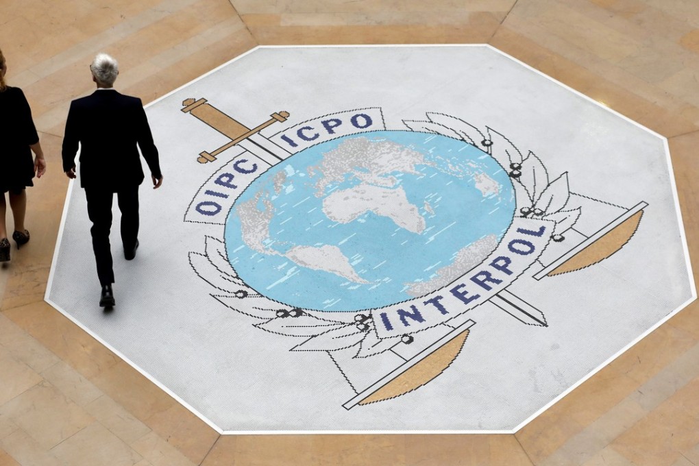 The Interpol logo at the agency’s headquarters in Lyon, France. Photo: AP
