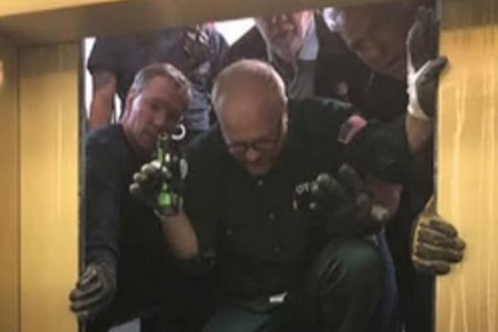 A scene from the rescue of six passengers in the Chicago skyscraper formerly known as the John Hancock Centre. Photo: CBS / Katy Martinez