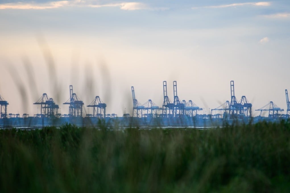 The port of the mainland Chinese city of Shenzhen, as seen from the shores of Deep Water Bay in Hong Kong. The city can catch up by supporting technology-focused Shenzhen with finding talent and raising funds, according to CPA Australia. Photo: AFP
