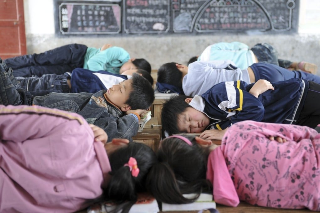 Nap time is mandatory in Chinese schools, usually after the lunch break. Photo: China Foto Press