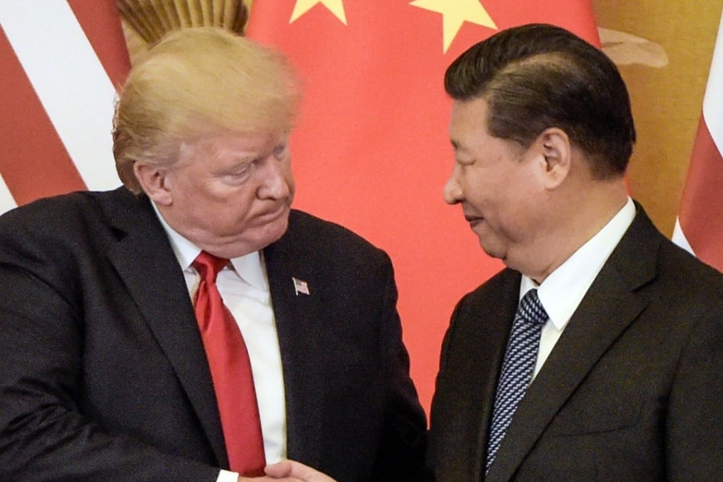 US President Donald Trump shakes hands with Chinese President Xi Jinping in Beijing in 2017. Photo: AFP