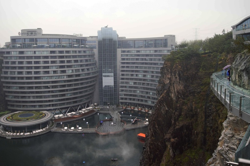 The 18-storey Intercontinental Shanghai Wonderland Hotel in Songjiang district of Shanghai has been built into the side of a huge hole in the ground left by a former rock quarry. Photo: AP