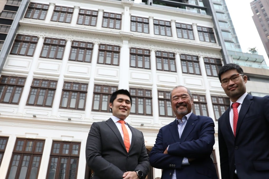 Alfred Li Kwok-lun (centre), co-owner of Kennedy Terrace, and his sons Li Man-hong (left) and Li Man-on (right), photographed outside the house at Nos 6 and 8, Kennedy Road, Mid-Levels. Photo: Nora Tam