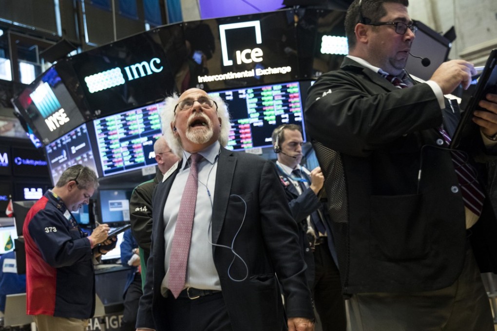 Analysts are warning that the effects of the trade war are creating financial market risks. Photo: AFP