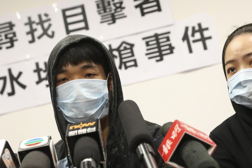 Chow’s son (left) and daughter-in-law speak to media outside Legco. Photo: K. Y. Cheng