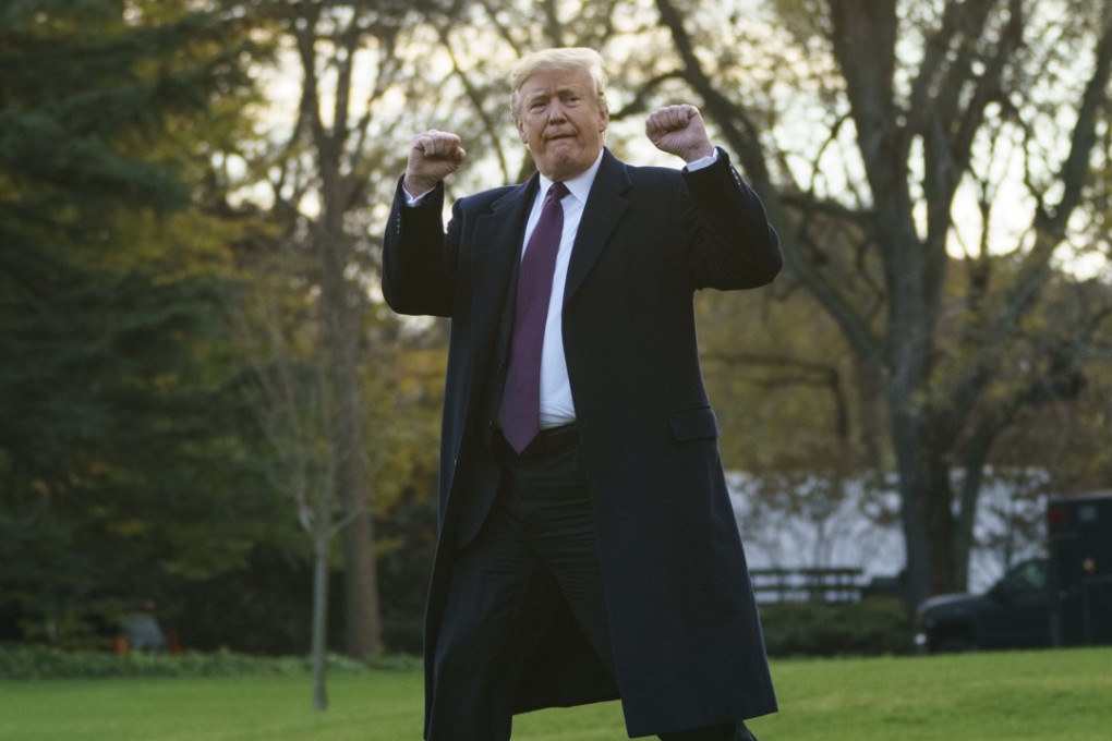 President Donald Trump gestures as he walks to Marine One after speaking to media at the White House in Washington. Photo: AP Photo