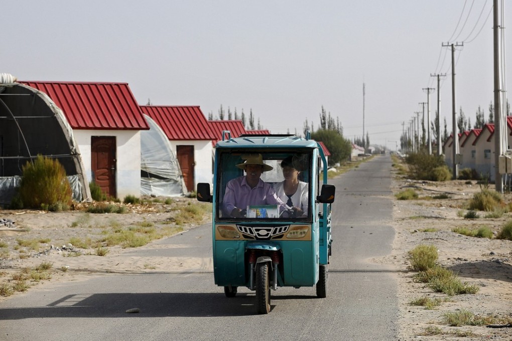 Unity New Village in Hotan, Xinjiang, where Han Chinese work and live alongside Uygur minorities – although most of the houses are empty. Photo: AP