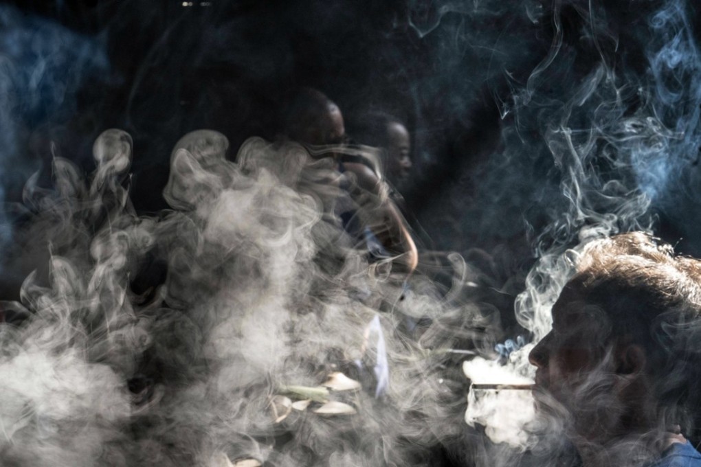 The implementation of an anti-tobacco law in 2015 is credited with a slight drop in Beijing’s adult smoking population to 22.3 per cent. Photo: AFP