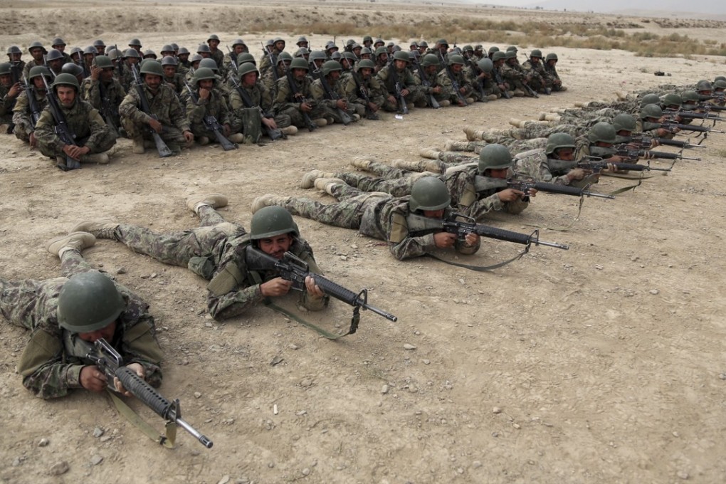 Afghan National Army soldiers during a live fire exercise at a military academy in Kabul on October 31, 2018. Photo: AP
