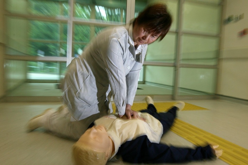 A ward manager, at North District Hospital’s accident and emergency department, demonstrates CPR techniques. It is important for people to have knowledge of first aid before they attempt to help strangers. Photo: Martin Chan