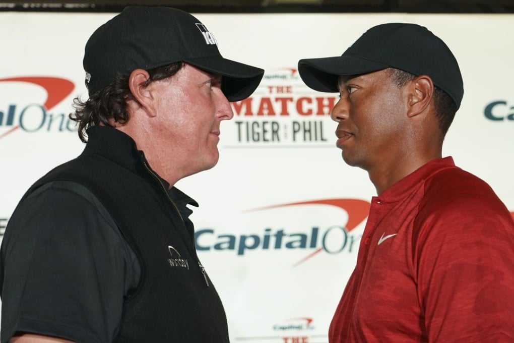 Phil Mickelson (left) and Tiger Woods. Photo: USA Today Sports