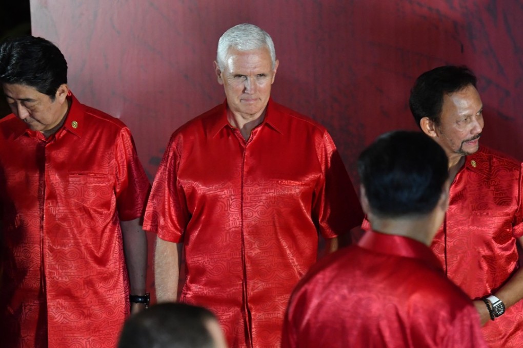 US Vice-President Mike Pence (centre) looks at President Xi Jinping (second from right) before the official family photograph during the Asia-Pacific Economic Cooperation summit at the Hilton Hotel in Port Moresby, Papua New Guinea, on November 17. This year, Apec countries failed to even agree on a routine joint statement. Photo: EPA