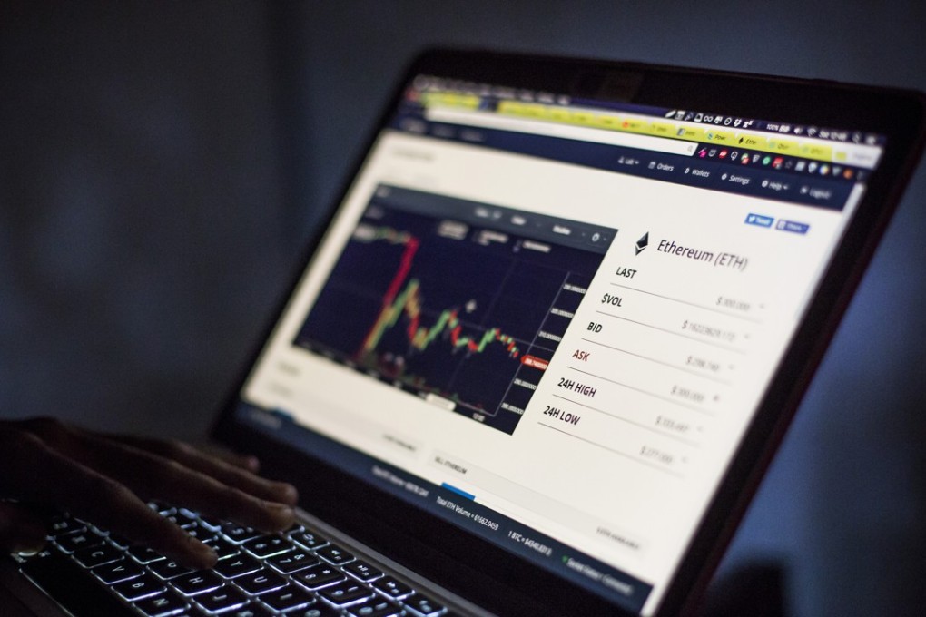 Eugene Mutai, bitcoin 'miner' and software developer, uses a laptop computer to view a web-based trading screen for ethereum (ETH) cryptocurrency in Nairobi, Kenya, on September 9, 2017. Photo: Bloomberg.