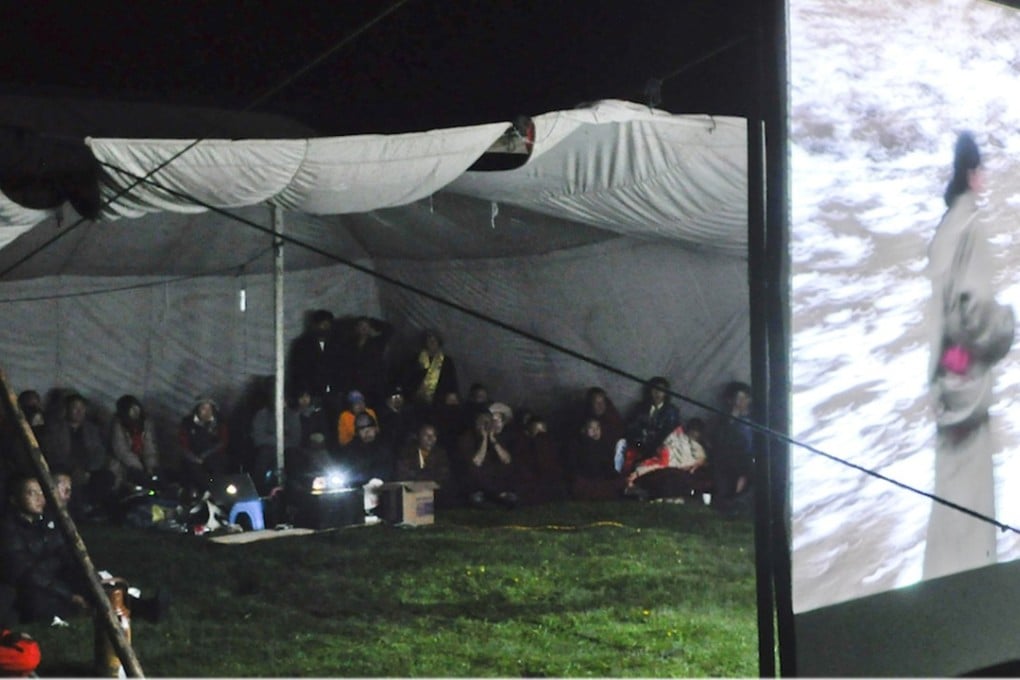 Villagers watch Qinghai nomad Lhaze’s film Yak Dung.