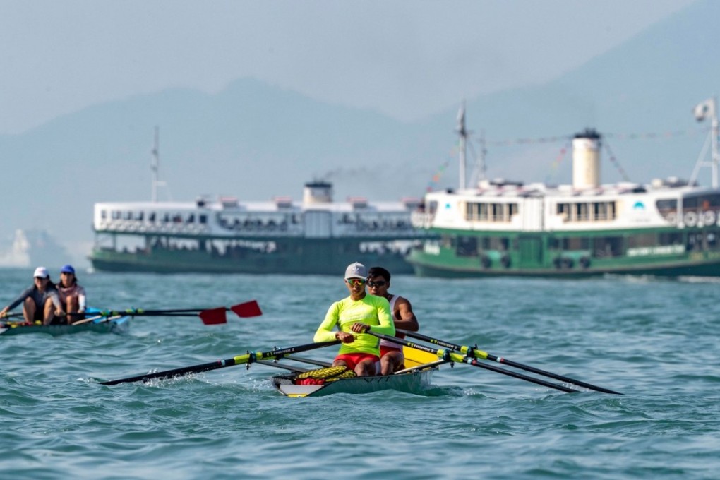 Hong Kong’s rowers Chiu Hin-chun (front) and Chan Yuk-man race along Victoria Harbour at the Asian Coastal Rowing Championships. Photos: Hong Kong Rowing Association