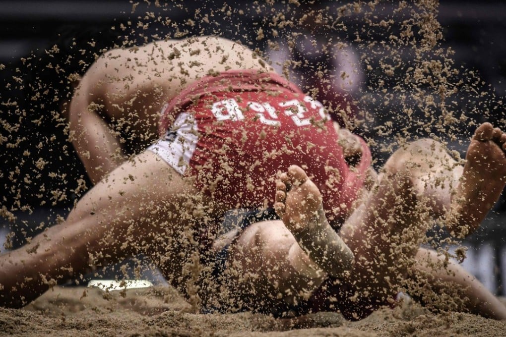 Wrestlers compete at the Korea Open Ssireum Festival in Andong, South Korea. Photo: AFP
