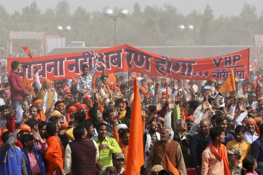 Supporters of Vishwa Hindu Parishad or World Hindu Council gathered to demand the construction of a Ram temple in Ayodhya, India on Sunday, November 25, 2018. Photo: AP