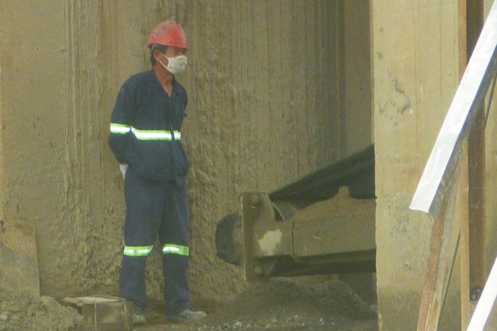 ‘Our lives are under threat, we live in fear’: a Chinese worker at the Bancheng Investments quarry in Uganda. Photo: Godfrey Olukya