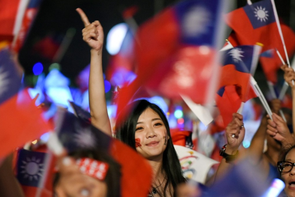 KMT supporters celebrate a series of gains in Saturday’s elections. Photo: EPA-EFE
