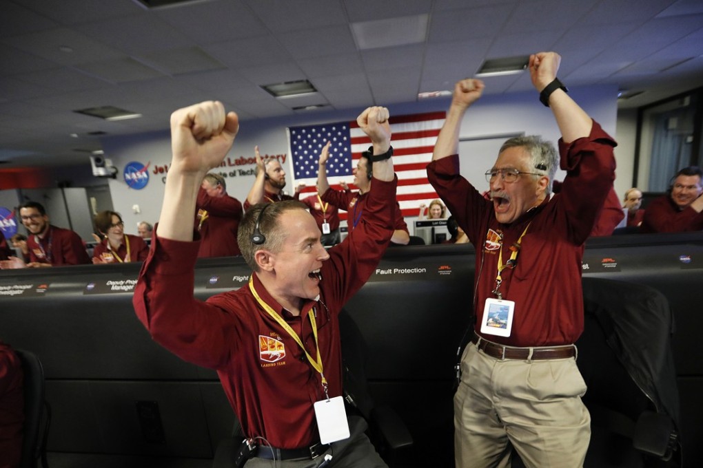 A Nasa spacecraft designed to drill down into Mars’ interior landed on the planet Monday after a perilous, supersonic plunge through its red skies, setting off jubilation among scientists. Photo: TNS