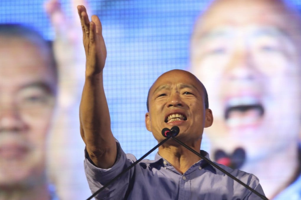 Han Kuo-yu reacts after winning the mayoral election in Kaohsiung on Saturday. Photo: AP