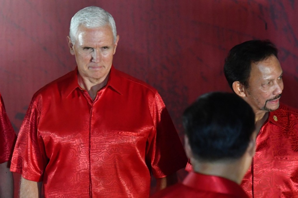 United States Vice President Mike Pence locks eyes with Chinese President Xi Jinping before the official “family” photograph at this month’s Apec summit in Papua New Guinea. Photo: EPA