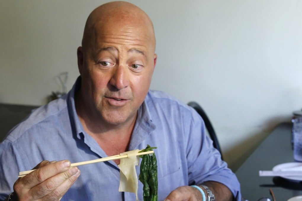 Travel Channel host Andrew Zimmern (shown in 2017), an award-winning chef, samples Taiwanese noodle soup at Happy Stony Noodle in Elmhurst, New York. Photo: AP