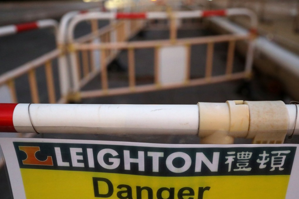 A warning sign at the Hung Hom station construction site; the construction work is led by Leighton Contractors (Asia) for the MTR Sha Tin to Central Link. Leighton Contractors (Asia) was barred from bidding for government contracts 15 months because of its work was found to be substandard. Photo: Nora Tam