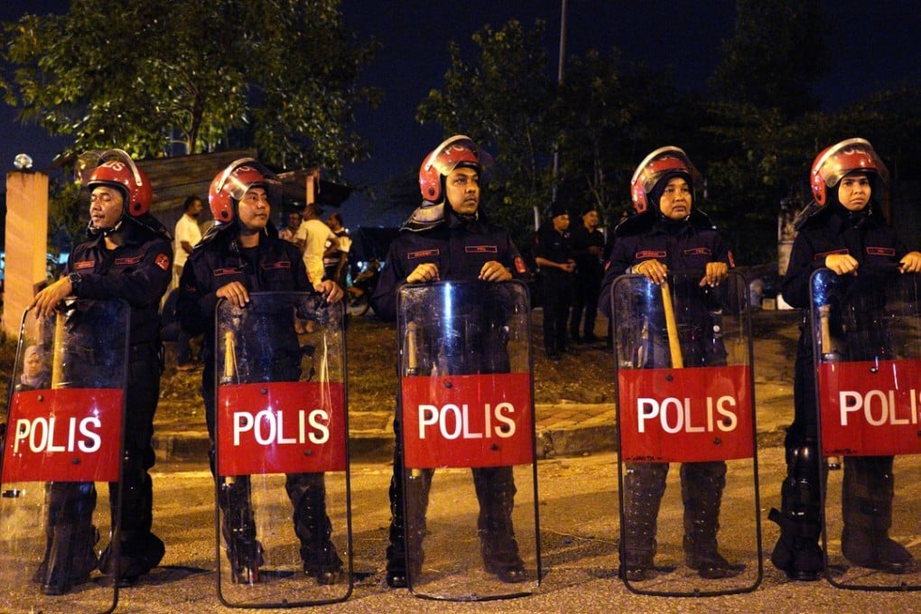 Malaysian police seized 47 pens and 336 notebooks containing Bible verses. Photo: AP