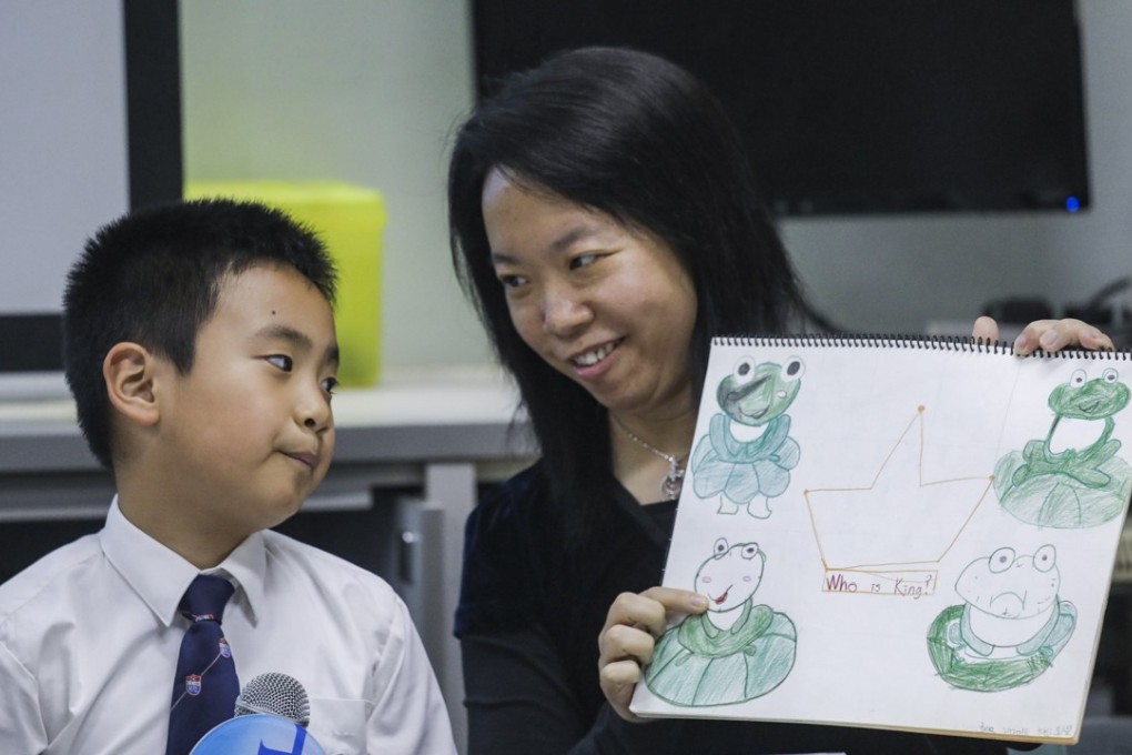 Pupil King Sze and Charlie Chan at a press conference on a two-year trial on how long holidays without homework effectively raised students’ learning capabilities. Photo: Tory Ho