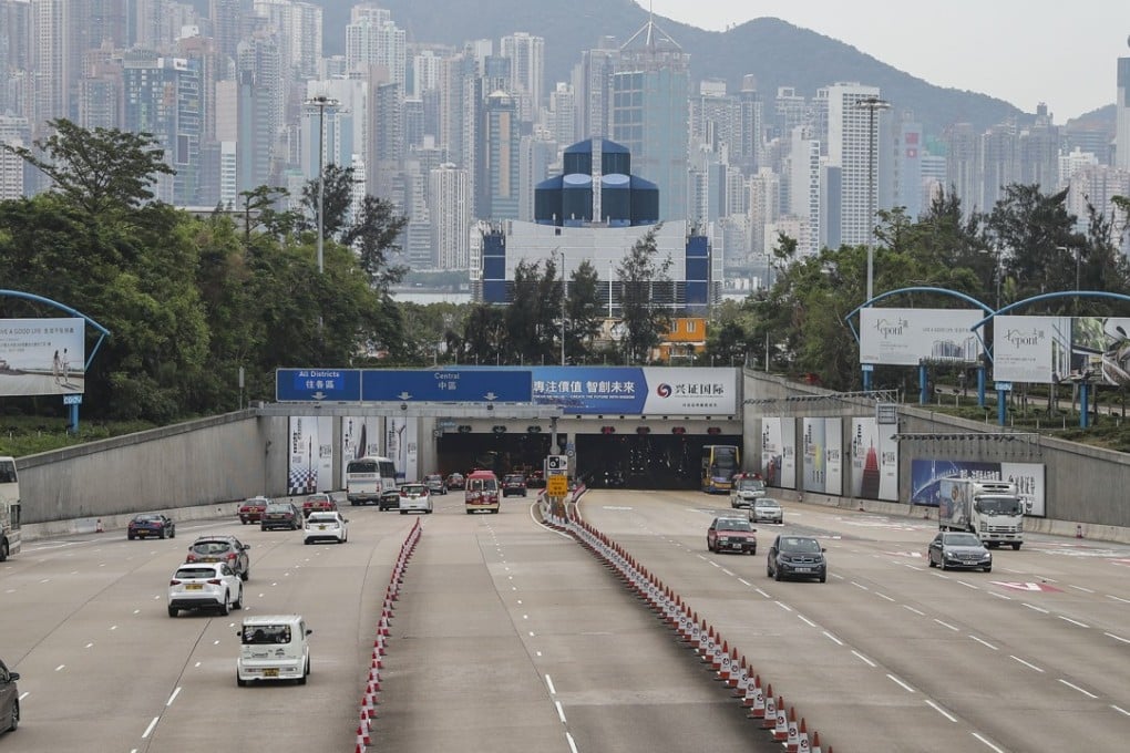 Private cars using the Western Harbour Tunnel currently pay a fee of HK$70. Under a government proposal, the operator would be compensated for lowering the toll to HK$50. But lower tolls may mean greater usage and hence higher revenue. Photo: Edward Wong