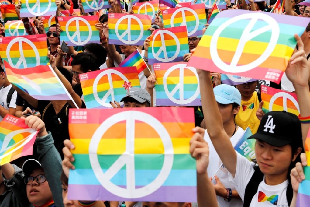 Marriage-equality supporters take part in a pride parade in Kaohsiung, Taiwan, on November 25 after losing the same-sex marriage referendum. Photo: Reuters