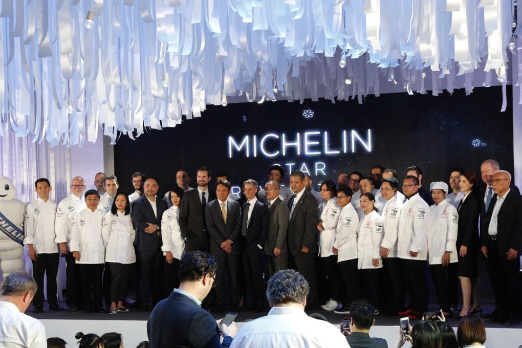 Khun Gee and Michelin star winners on stage at the Michelin Star Revelation 2019, in Bangkok, Thailand. Picture: EPA