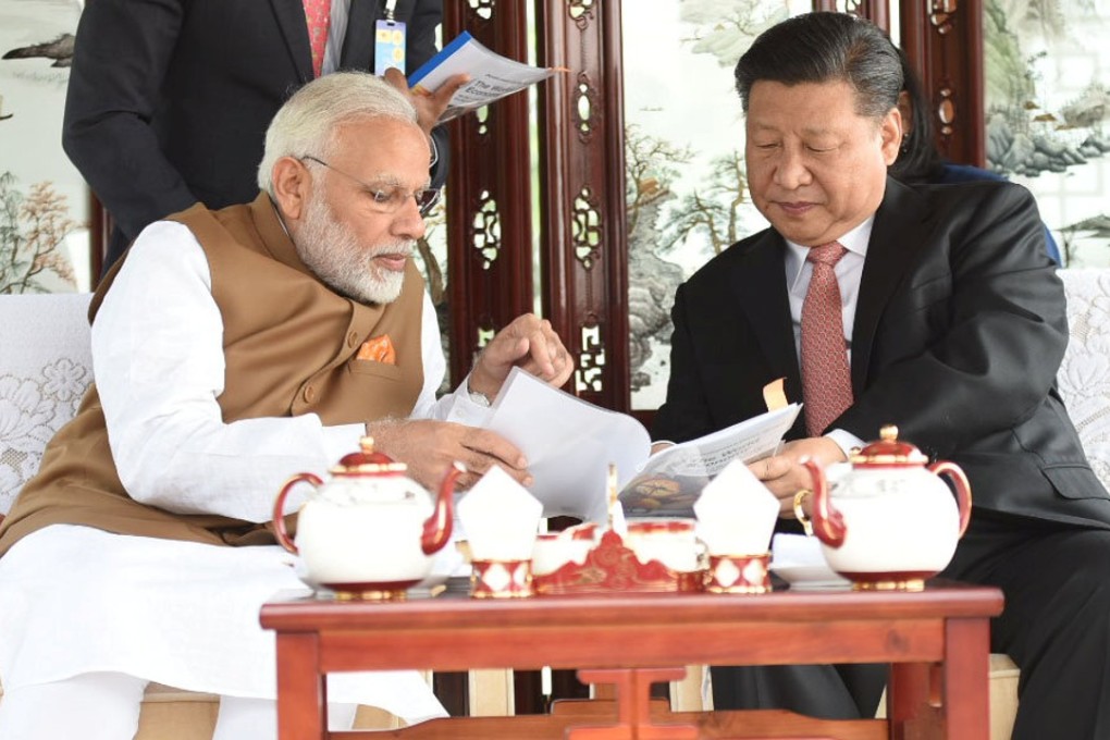Indian Prime Minister Narendra Modi and Chinese President Xi Jinping take a boat ride on the East Lake in Wuhan, China. Photo: Reuters