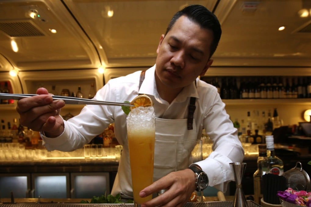 Gerry Olino mixes a Hurricane Mania at Foxglove, in Central. Pictures: Jonathan Wong