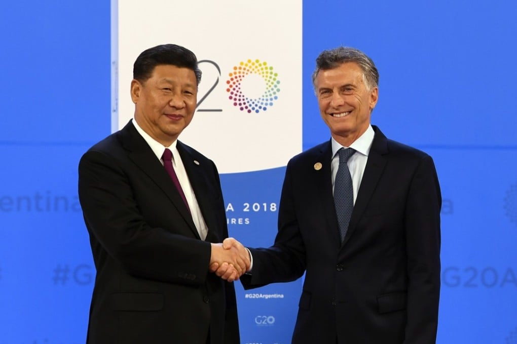 Chinese President China Xi Jinping is welcomed by Argentine President Mauricio Macri at the G20 summit in Buenos Aires on Friday. Photo: EPA-EFE